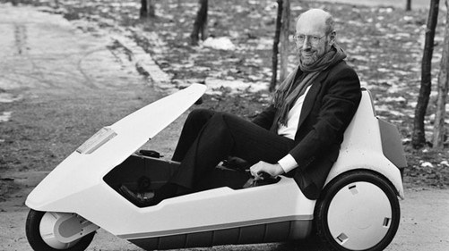 Sir Clive Sinclair and the Sinclair C5 electric vehicle.