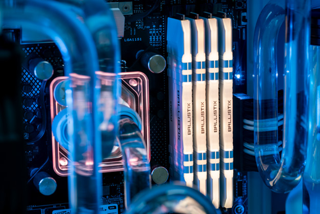 Some white Crucial Ballistix RGB memory installed inside a PC.