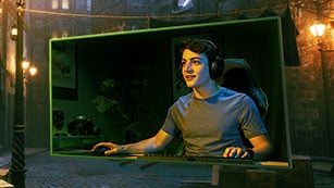 A man playing games on a PC