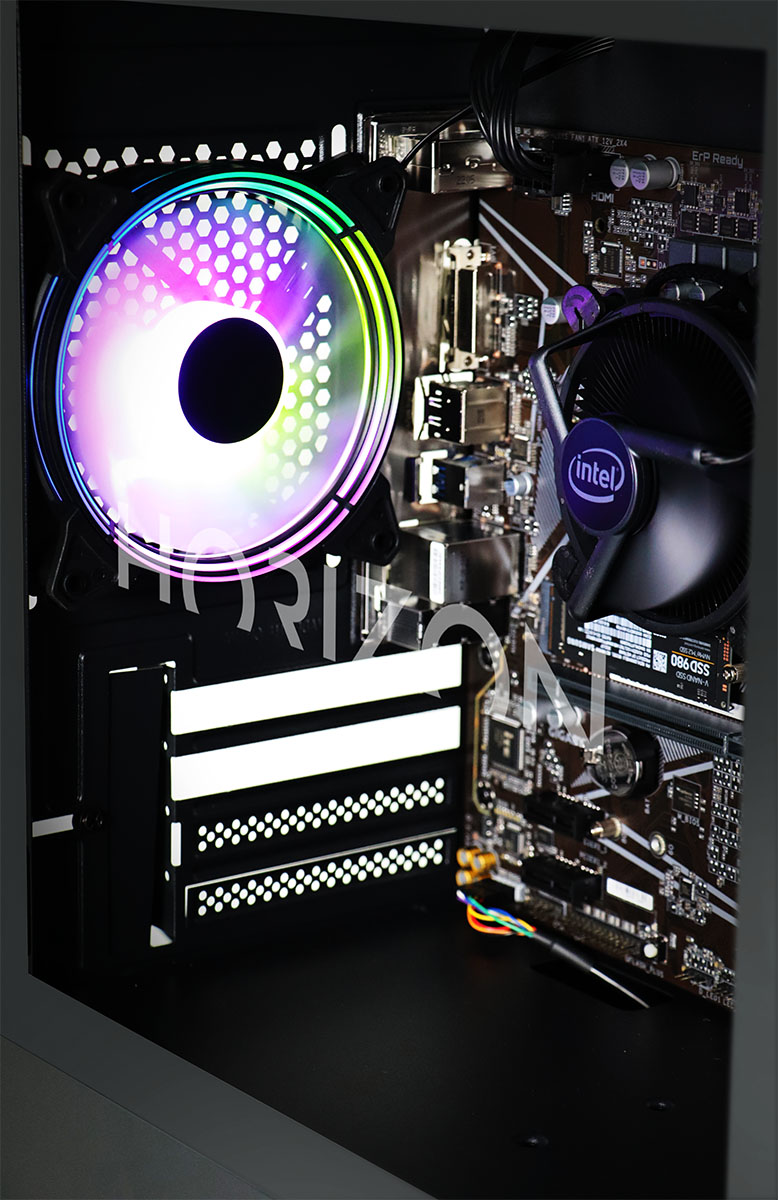 The inside of the PC, showing the CPU area and rear RGB fan