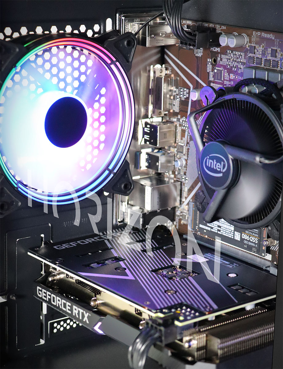 The inside of the PC, showing the CPU area and rear RGB fan