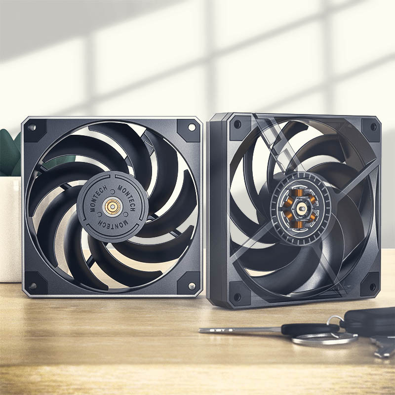 Two METAL fans stood side by side on a desk.