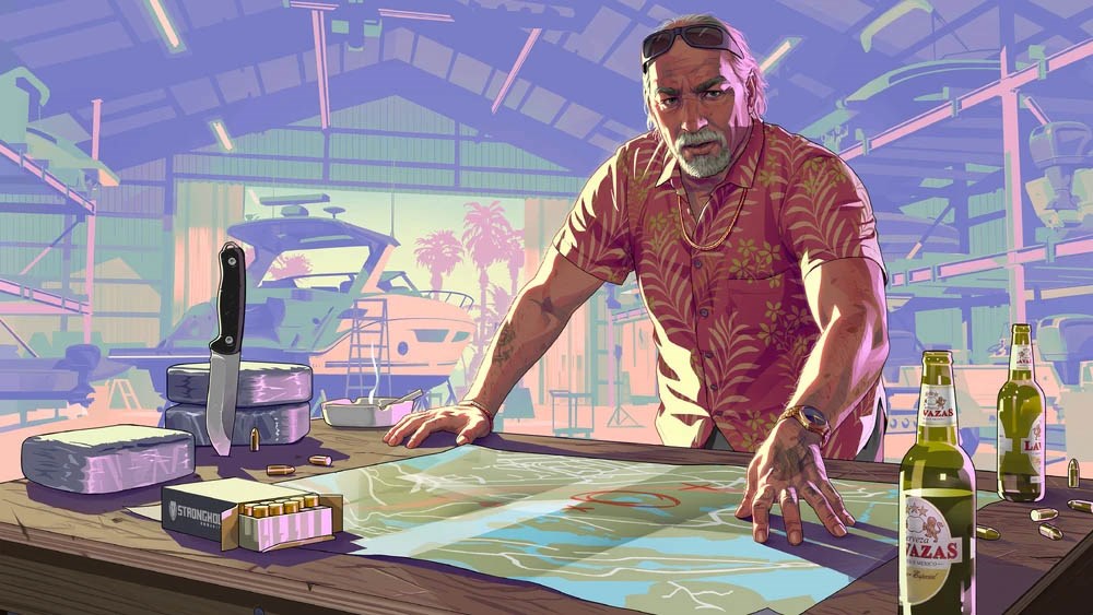 Brian Heder from GTA VI leans over a table covered in maps, drugs, bullets, and beer inside a boatyard warehouse, wearing a floral shirt and exuding the vibe of a laid-back but lethal smuggler.