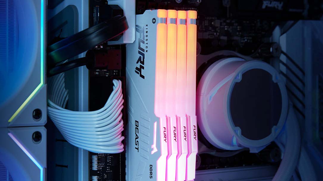 Kingston FURY RGB DDR5 RAM modules installed in a custom creative workstation.