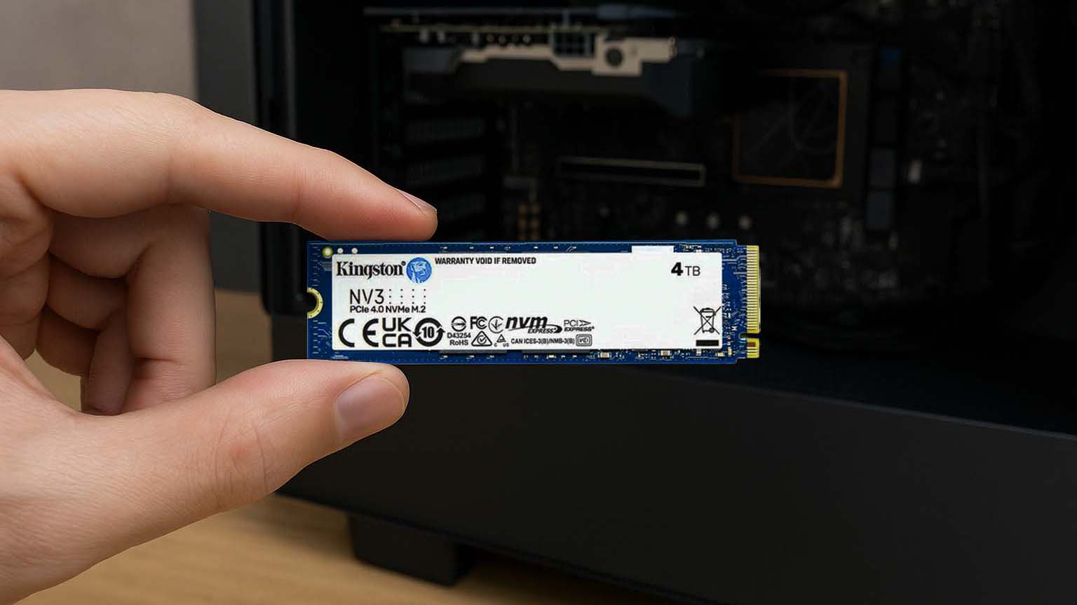 Kingston NV3 NVMe SSD installed inside a desktop PC used for creative work