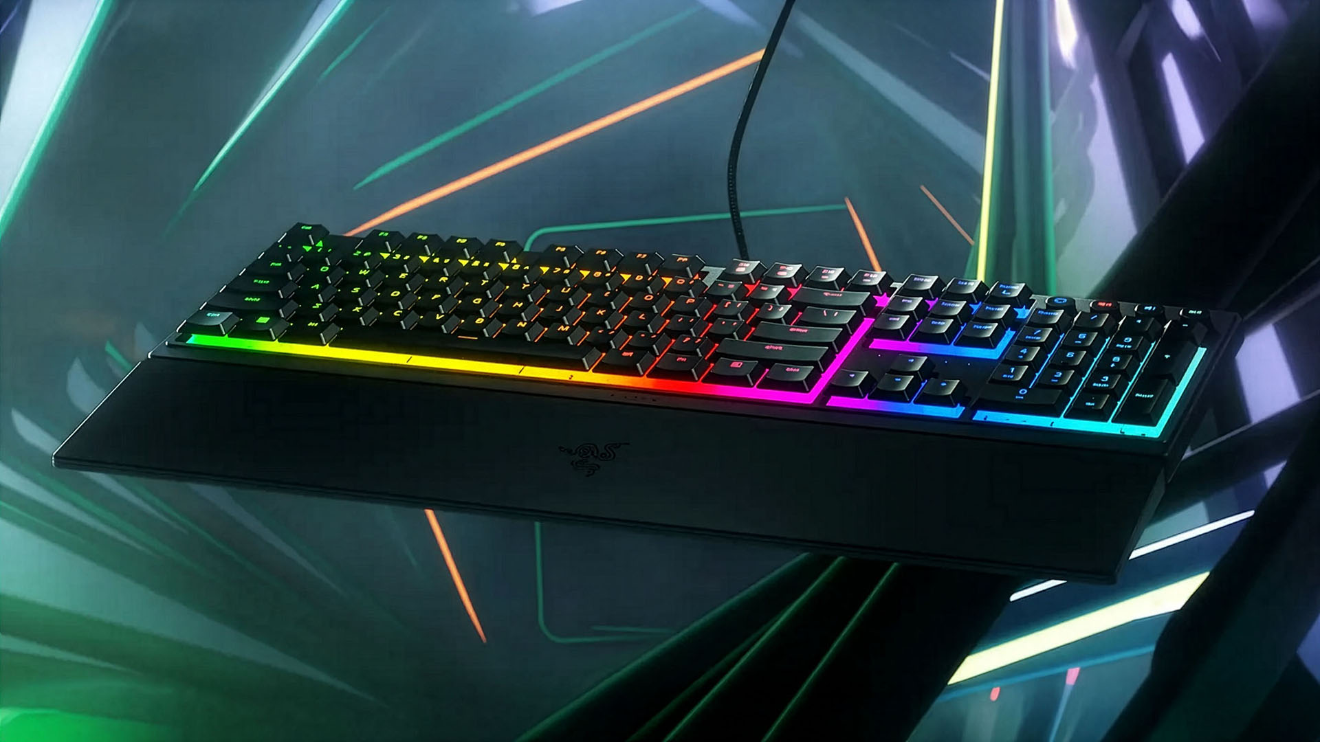 A Razer Ornata V3 gaming keyboard glowing with vibrant RGB lighting, shown floating against a futuristic neon background.