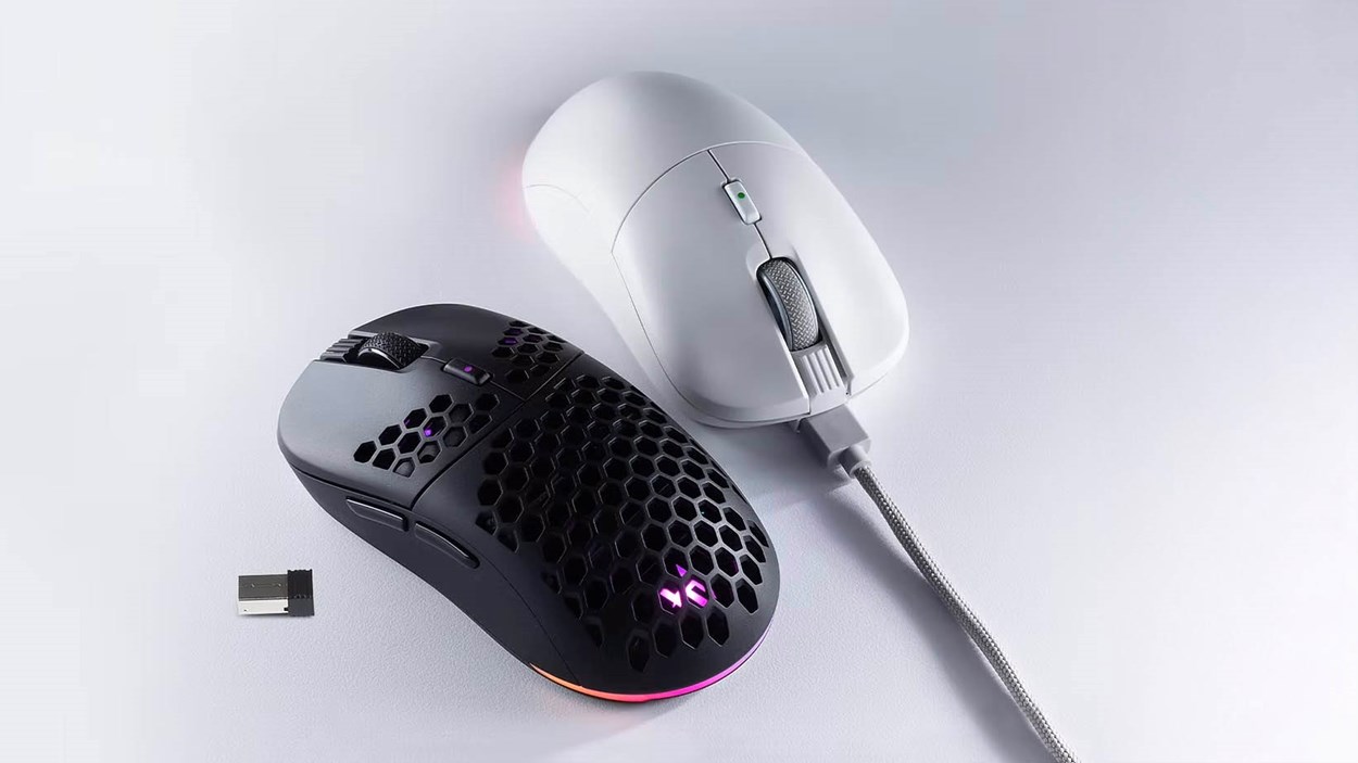 Tecware Pulse Elite gaming mice in black and white, showcasing wired and wireless modes with honeycomb shell design, RGB lighting, and USB dongle on a white surface.