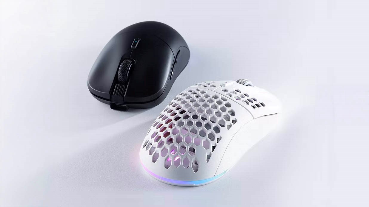Tecware Pulse Elite gaming mice in black and white variants, featuring solid and honeycomb shell designs with RGB lighting, displayed on a minimalist white surface.