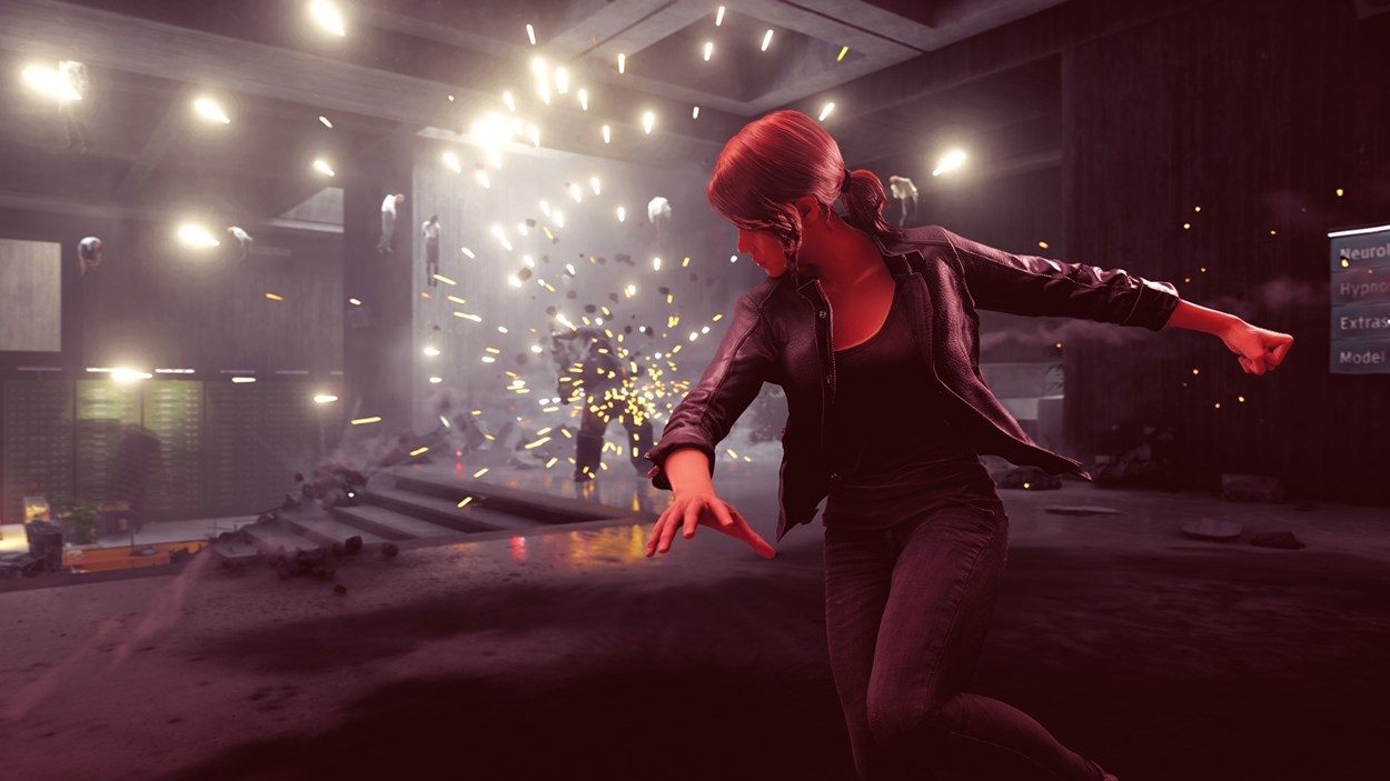 Screenshot from the game Control showing the protagonist Jesse Faden using her supernatural abilities in a dramatic action scene, with flying debris, glowing lights, and a mysterious enemy in the background.
