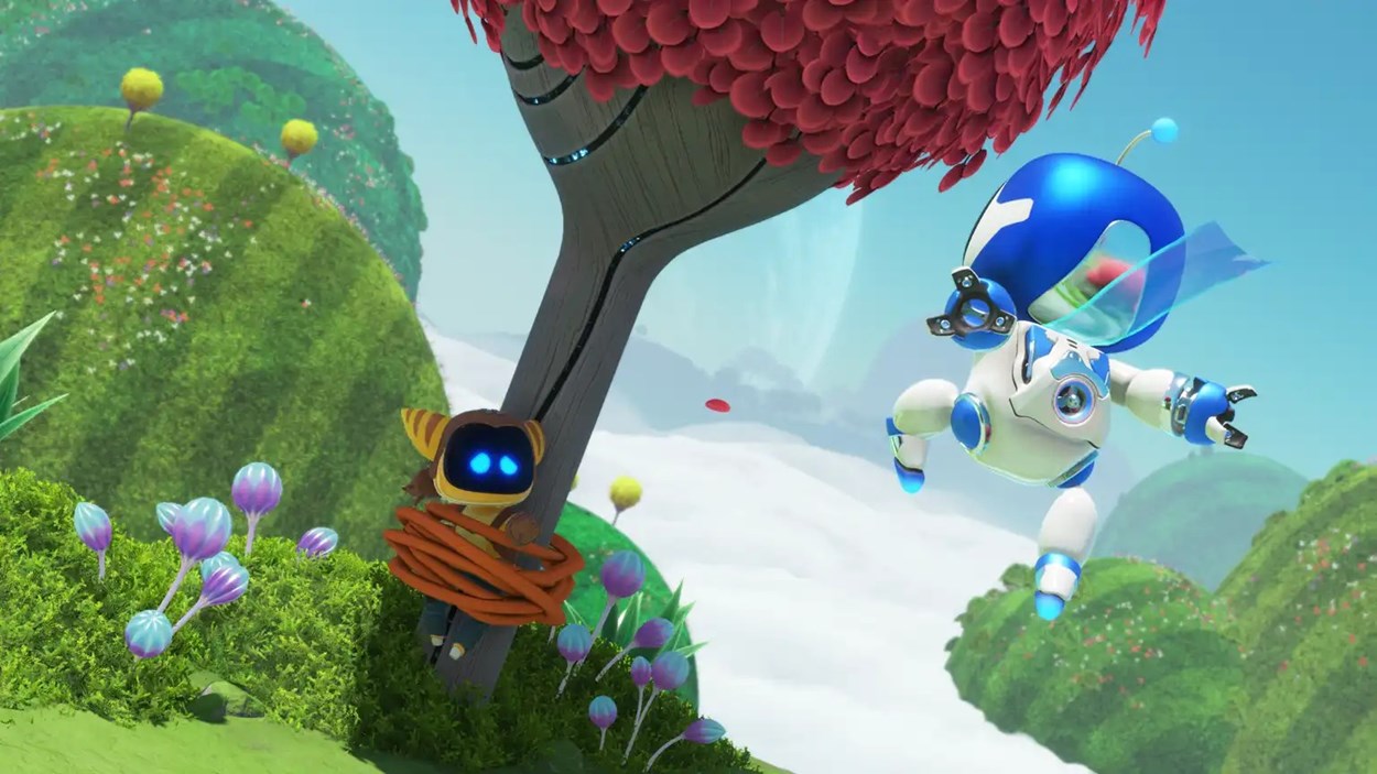 Astro Bot jumping near a colorful tree in a vibrant fantasy landscape, showcasing the whimsical design of the Game of the Year 2024 winner.