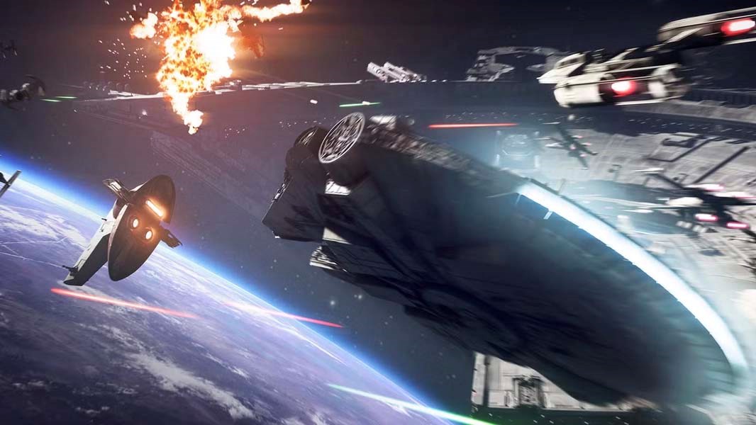 The Millennium Falcon leads a fleet of starfighters in a space battle above a planet in Star Wars Battlefront II, with laser fire, explosions, and a massive Star Destroyer in the background.