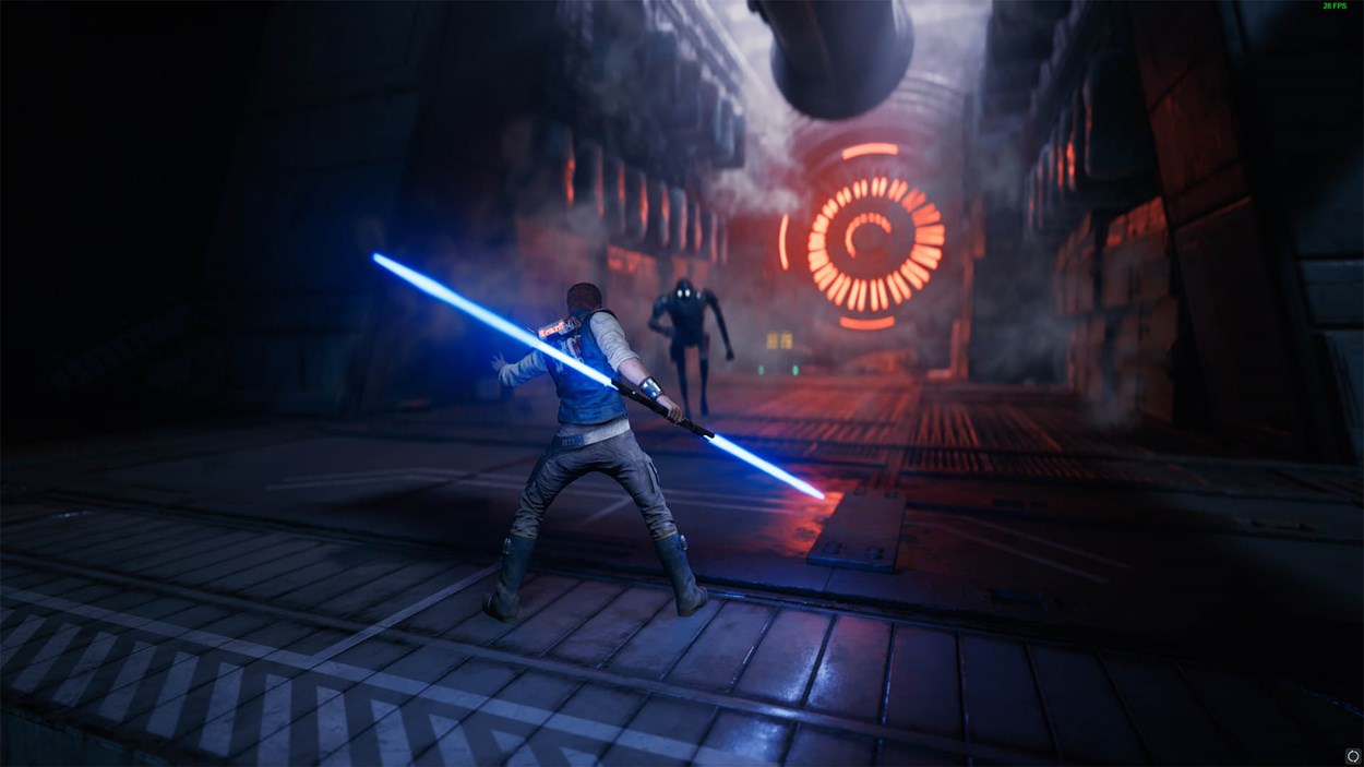 Cal Kestis wields a blue double-bladed lightsaber in a dark, industrial corridor as he prepares to battle a hostile droid in Star Wars Jedi: Survivor.