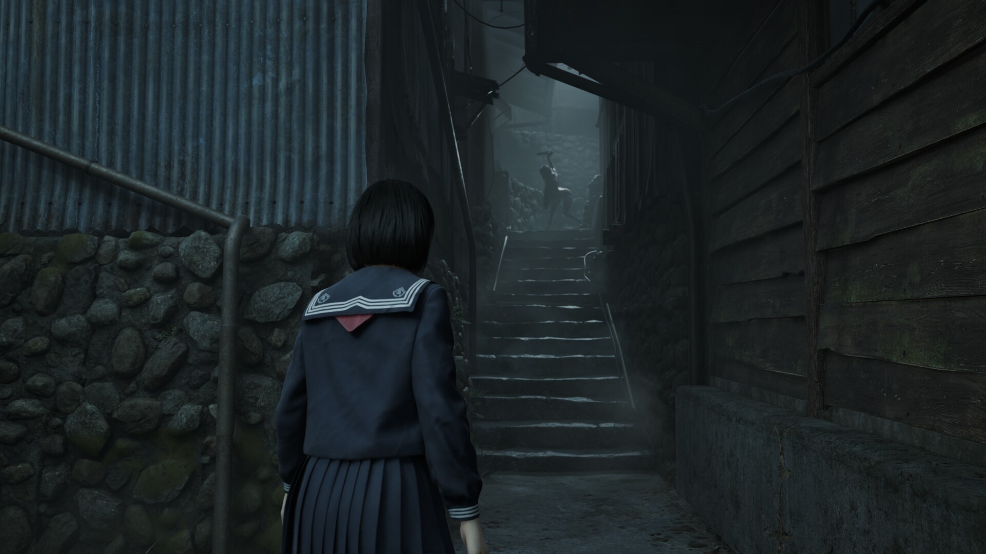 Silent Hill f scene showing Hinako Shimizu in a school uniform walking toward a dark staircase, with a shadowy monster figure looming at the top.