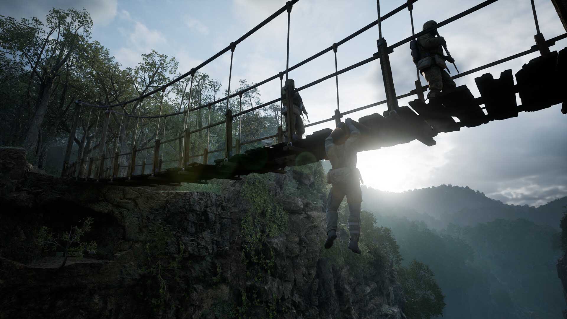 Snake hanging from a rope bridge while armed soldiers patrol above in Metal Gear Solid Delta: Snake Eater remake, with a mountain