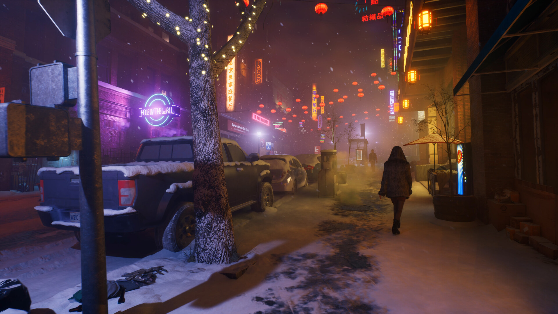 Snow-covered city street in Vampire: The Masquerade – Bloodlines 2, illuminated by neon signs and lanterns in Seattle’s Chinatown district.
