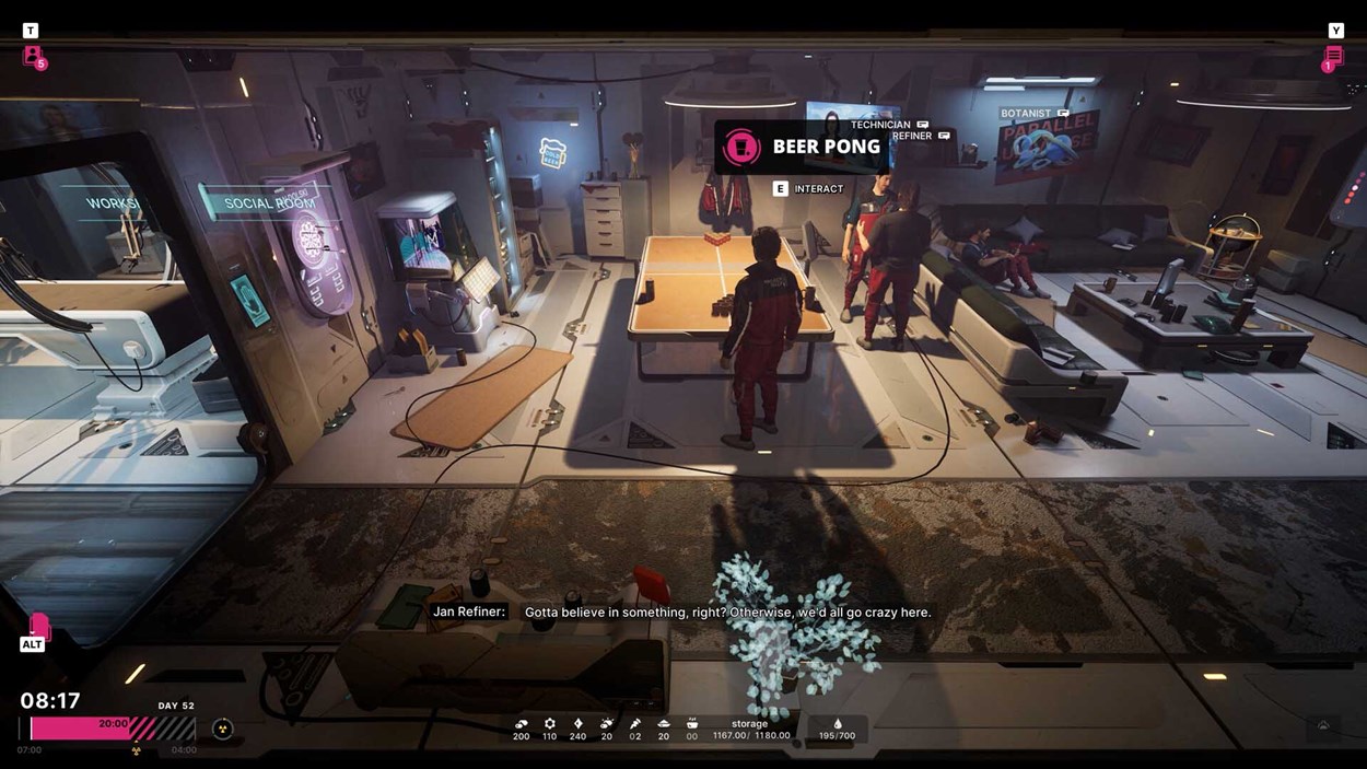A scene inside the mobile base in The Alters, showing multiple clone characters relaxing and playing beer pong in the social room. The environment is detailed and lived-in, with couches, posters, and ambient lighting. On-screen dialogue from “Jan Refiner” reflects the game’s emotional tone and psychological themes.