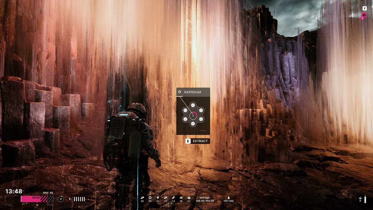 A lone astronaut-like character stands in front of a glowing crystalline rock formation with an on-screen prompt to extract a resource called Rapidium.