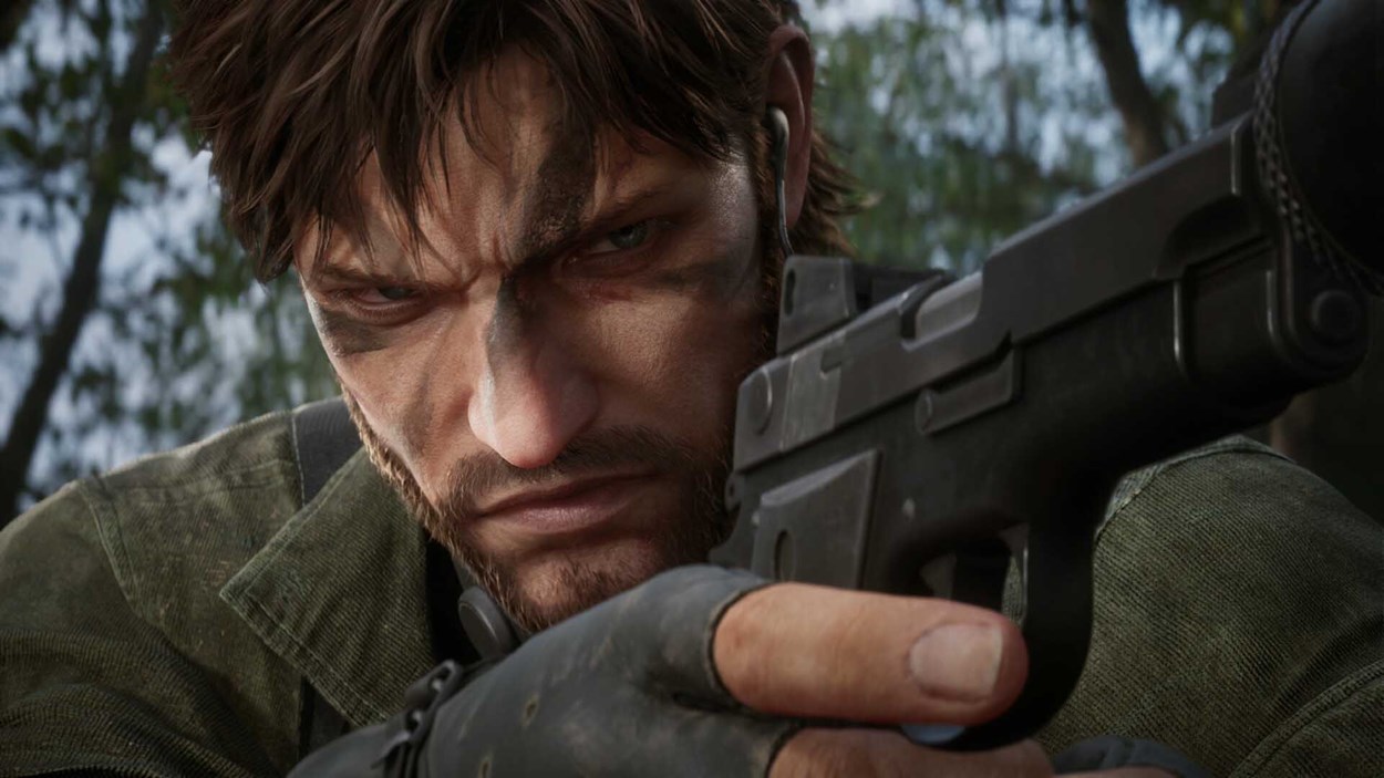 Close-up of the main character from Metal Gear Solid ?: Snake Eater aiming a pistol with intense focus in a forest setting.